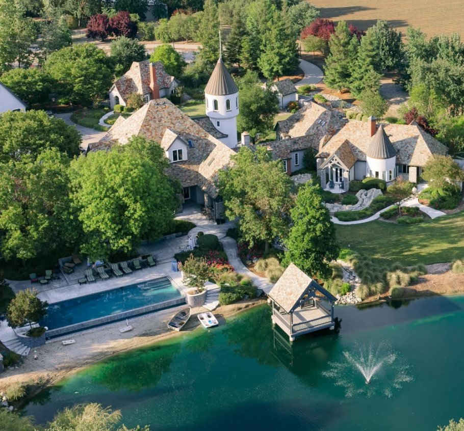 The estate from above, with the pool, dock and fountain
