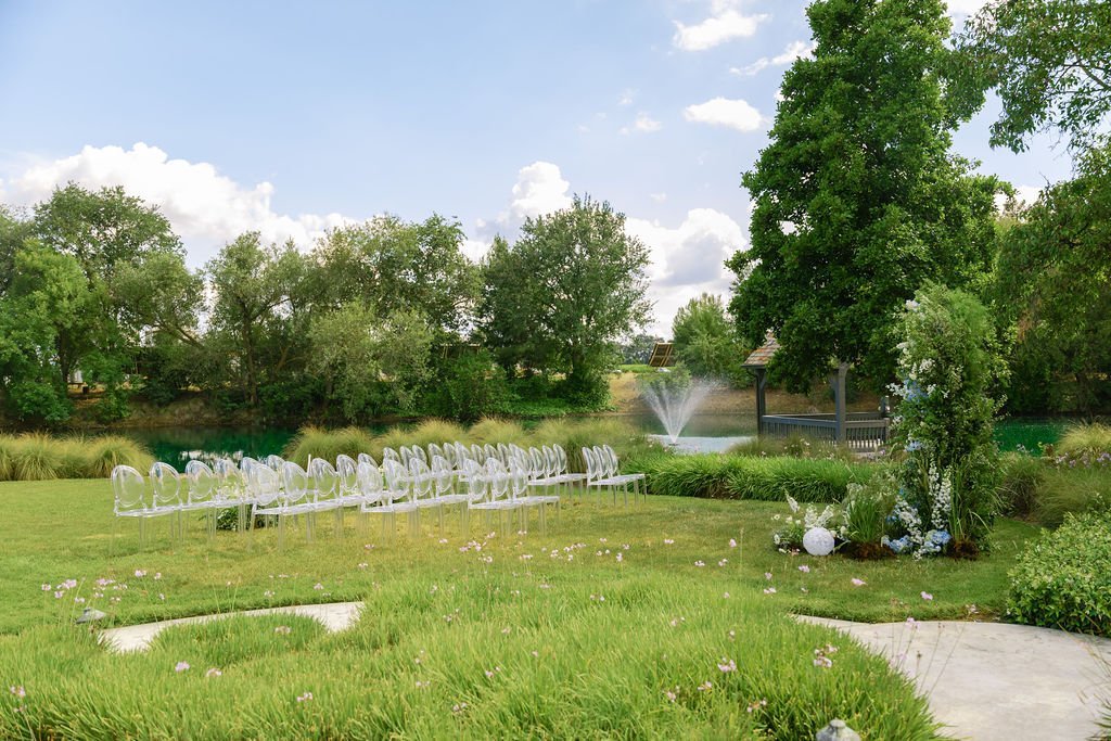 Ceremony seating facing the lake and fountain