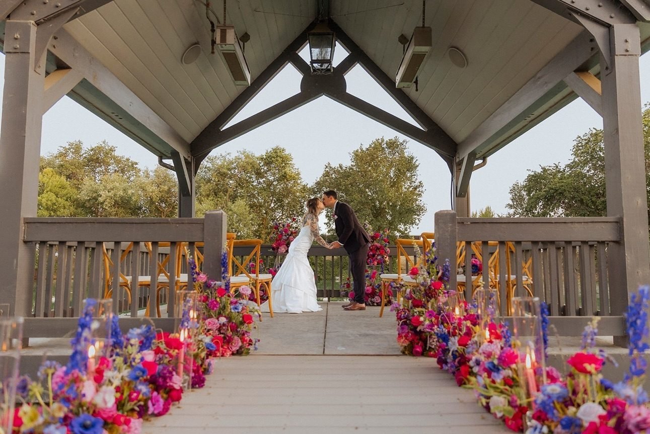 A wedding ceremony in the lakeside pavilion