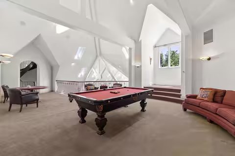 The game room with a pool table